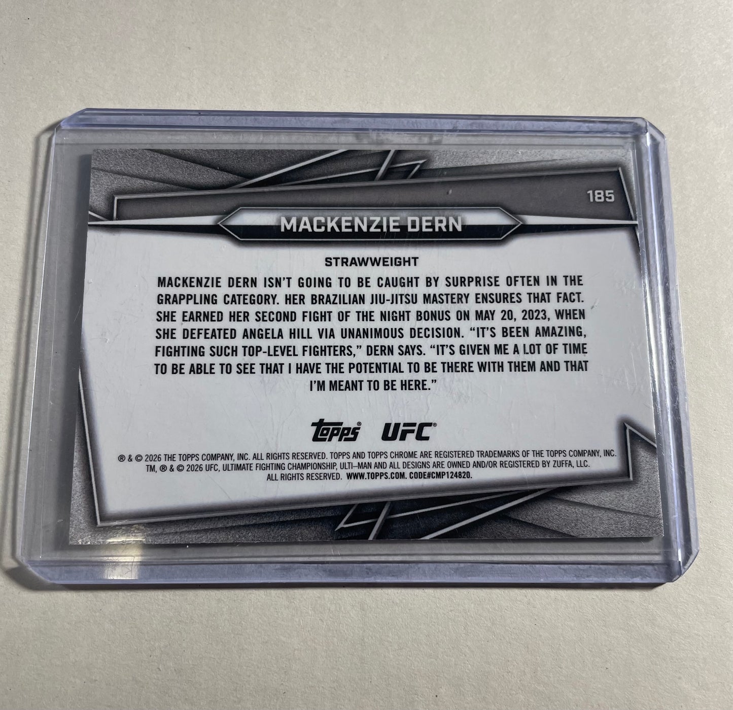 2025 Topps Chrome UFC Mackenzie Dern Green refractor card is numbered 35/99.