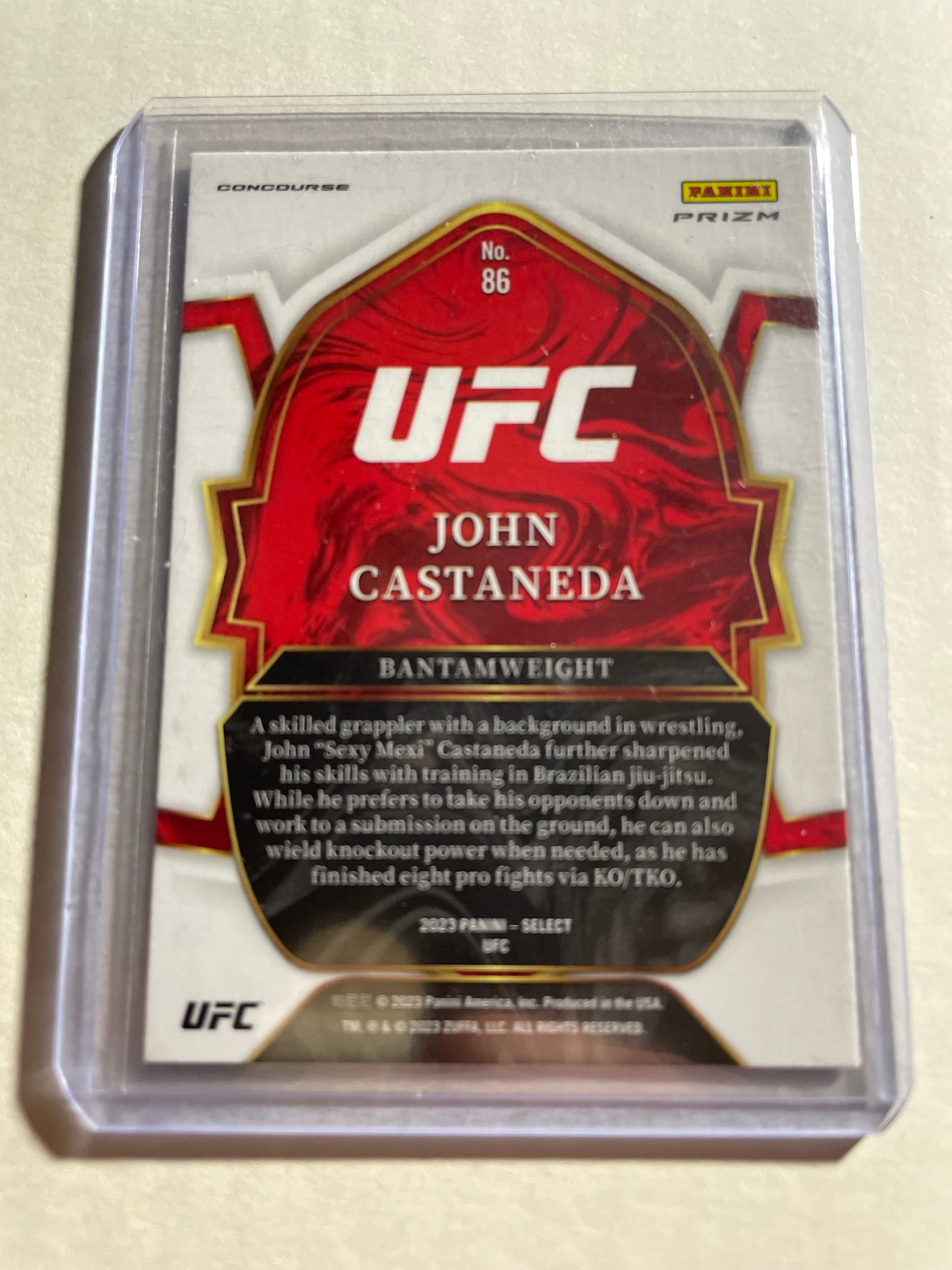 2023 Panini Select UFC John Castaneda Rookie Card #86, featuring a silver Prizm