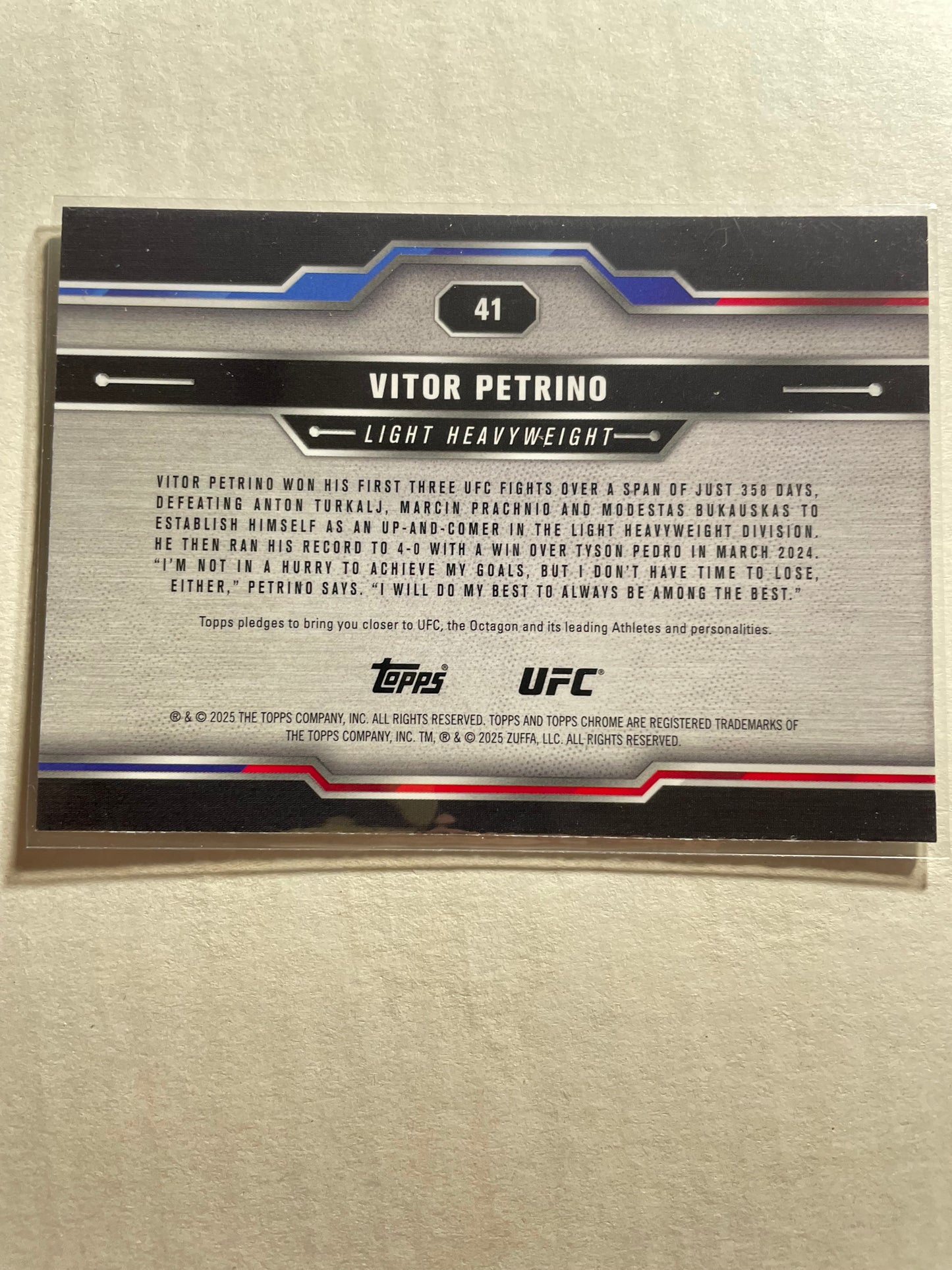 2025 Topps Chrome UFC #41 Vitor Petrino rookie card, showcasing the light heavyweight fighter in a silver refractor parallel