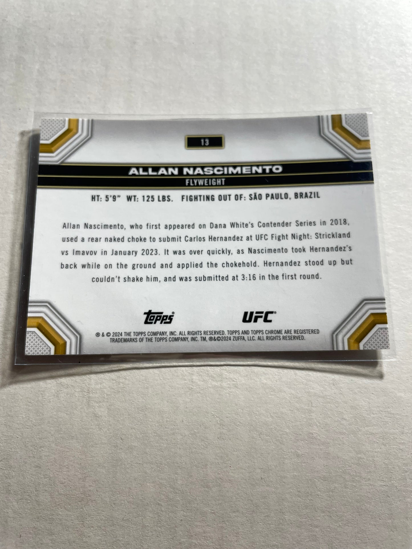 2024 Topps Chrome UFC #13 featuring flyweight fighter Allan Nascimento.