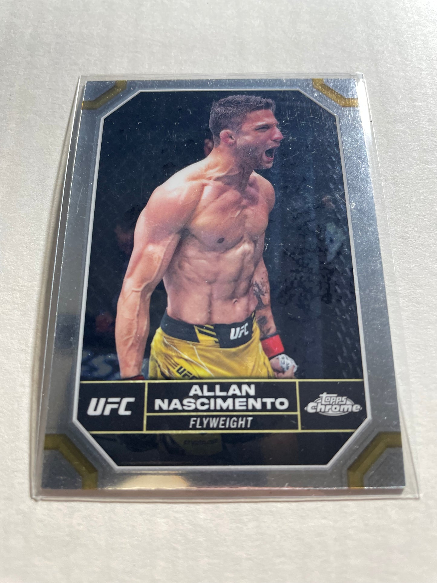 2024 Topps Chrome UFC #13 featuring flyweight fighter Allan Nascimento.