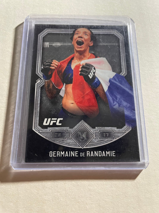 2017 Topps Museum Collection Germaine de Randamie UFC card features a photograph of the fighter celebrating with a French flag