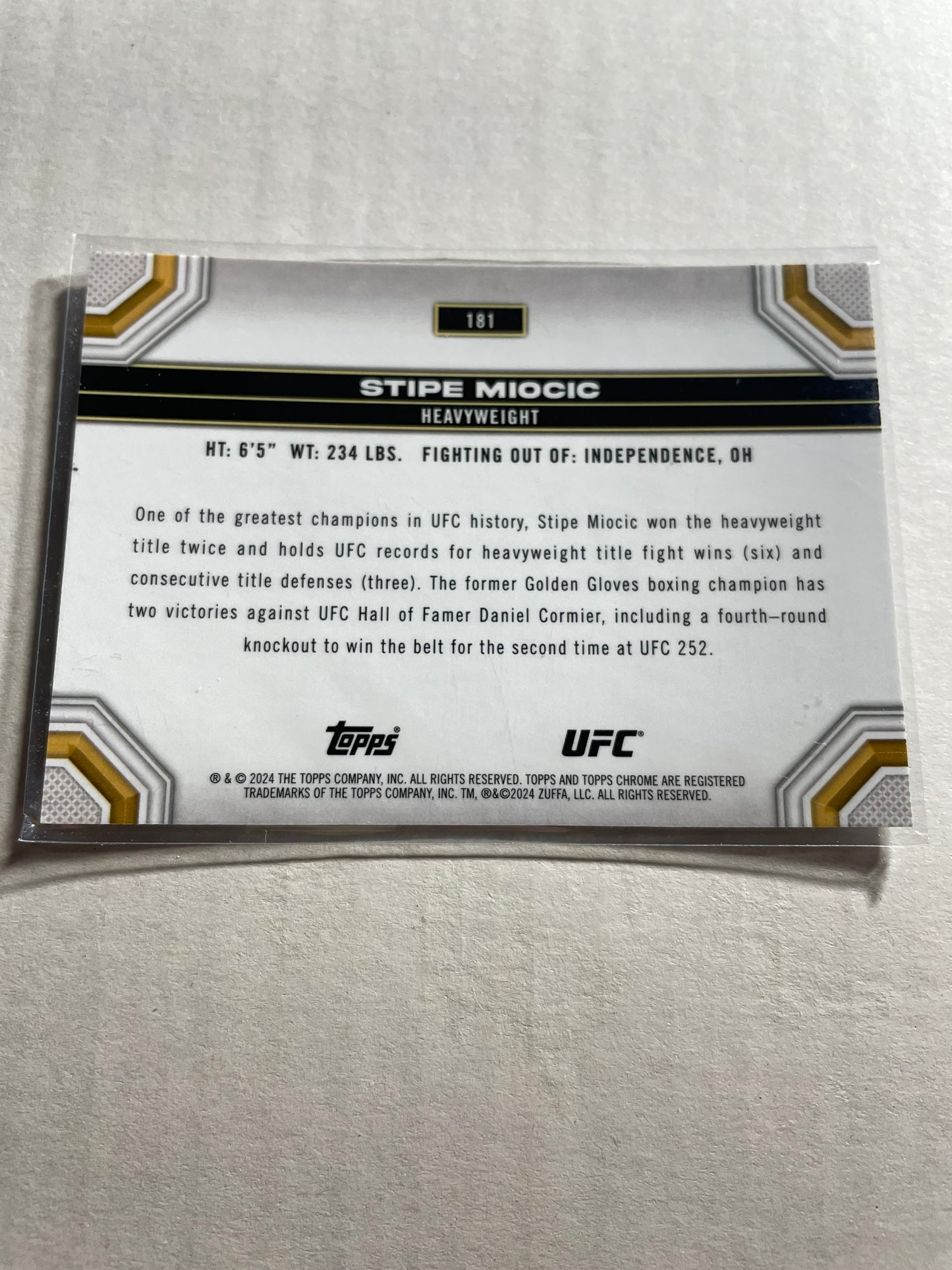 2024 Topps Chrome UFC #181 Stipe Miocic trading card features a silver / black refractor