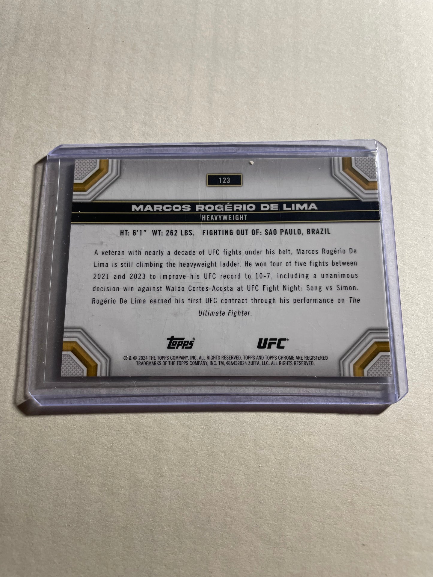2024 Topps Chrome UFC Sepia Refractor trading card featuring Marcos Rogerio De Lima.