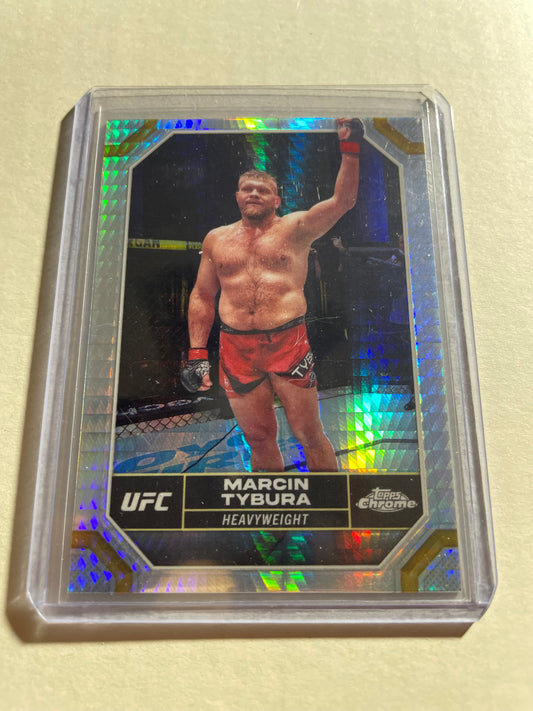 2024 Topps Chrome UFC card featuring fighter Marcin Tybura.The card is identified as the "Prism Lazer Refractor" parallel version of base card #122.